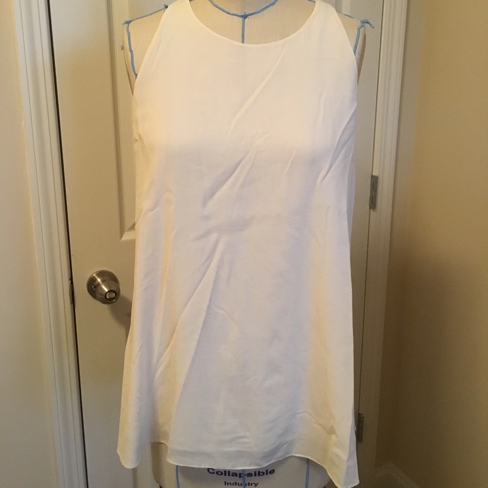 Pleated cross back swing tank